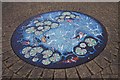 SP2806 : Artwork in paved area outside the Tower Centre, Alvescot Road, Carterton, Oxon by P L Chadwick