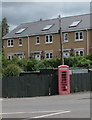 SO2913 : Grade II listed red phonebox in Llanfoist by Jaggery