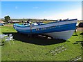 NT9350 : 'Boy's Own' fishing coble, Chain Bridge Honey Farm by Andrew Curtis