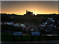 NZ9011 : Sunrise Behind Abbey Headland by David Dixon