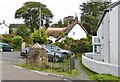 SW7624 : Pretty cottage and the village well, Manaccan, Cornwall by Derek Voller