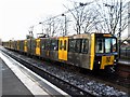 NZ3467 : Metro train at Meadow Well Station by Andrew Curtis