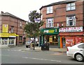 SJ8794 : Shops on Stockport Road by Gerald England