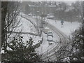 SE1321 : The north end of Delf Hill during a snow shower by Humphrey Bolton