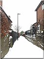 SK3284 : Virgin snow in the ginnel by Graham Hogg