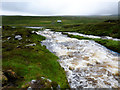 NB1017 : Abhainn Thabhsaigh runs down to Ceann Loch Reasort by Andy Waddington