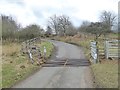 NZ0795 : Damaged cattle grid by Oliver Dixon