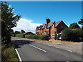 SP7467 : Cottages on Brampton Lane, near Pitsford by Malc McDonald