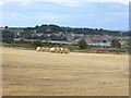 NU2309 : Harvested field near High Buston by Oliver Dixon