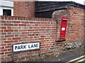 TL8528 : Park Road Victorian Postbox & Park Lane sign by Geographer