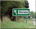 TL9525 : Mersea sign on the A12 London Road by Geographer