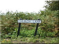 TM1134 : Church Lane sign by Geographer