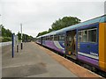 SJ8993 : Stockport bound train at Reddish South by Gerald England