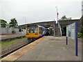 SJ8993 : Stockport bound train at Reddish South by Gerald England