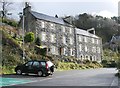 NM8630 : Tenements beside the car park by Richard Sutcliffe