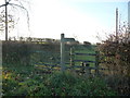 NZ5011 : Public footpath signpost and stile, Sneck Gate Lane by Christine Johnstone