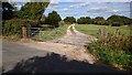 SU7839 : Metal gate leading on to a track by John P Reeves