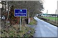 NS9939 : Quothquan village sign by Jim Barton