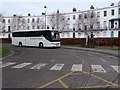 SO9422 : Grindles Tours coach in the Royal Well by Philip Halling