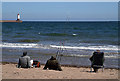 NU0052 : Sea anglers at Sandstell Point by Walter Baxter