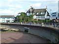 SX8960 : Three thatched houses on Roundham Road by Christine Johnstone