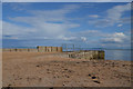 NH8292 : Abandoned Pier at Embo, Sutherland by Andrew Tryon