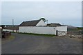 NX0657 : Roadside buildings at Whiteleys by Graham Robson