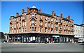 NS5964 : Red sandstone tenements by Richard Sutcliffe