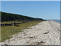 NJ3067 : Pillbox and shingle bank, Innes Links by Alan Murray-Rust