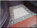 SH6874 : A tiled shop doorway on Station Road, Llanfairfechan by Meirion