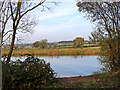 SO8597 : Pool and farmland near Trescott in Staffordshire by Roger  D Kidd