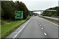 NS3335 : Footbridge over the A78 near Meadowhead Industrial Estate by David Dixon