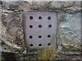 SH6268 : A slate ventilation grille at church, Llanllechid by Meirion