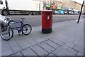 TQ3981 : Postbox on Barking Road, Canning Town by Ian S