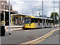 SJ8096 : Metrolink Tram at Imperial War Museum Tram Stop by David Dixon