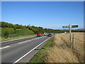 SY6690 : A35 and footpath near Poundbury by Malc McDonald