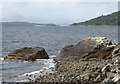 NG8127 : Rocks on the shoreline at Reraig by Russel Wills