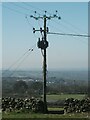 SH6268 : Electricity Pole in field, Llanllechid by Meirion