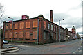 SJ9598 : Clarence Mill, Stalybridge by Chris Allen