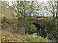 NS5574 : Railway bridge over the Allander Water by Richard Sutcliffe