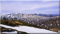 NN4464 : Snow patch below summit of Meall na Meoig by Trevor Littlewood