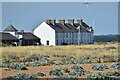 TM3642 : Coastguard cottages at Shingle Street by Simon Mortimer