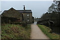 SD9354 : Pennine Way crosses the Leeds and Liverpool Canal by Chris Heaton