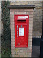 TF1308 : Wall-mounted EIIR postbox on High Street, Maxey by Paul Bryan