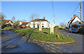 TM3473 : Huntingfield village sign by Adrian S Pye