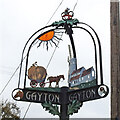 TF7319 : Gayton village sign detail 2 by Adrian S Pye