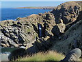 NJ5767 : Natural arch near Redhythe Point by Nigel Feilden