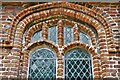 TM1965 : Kenton, All Saints Church: Lovely brick window in the Garney family chantry chapel (1524) (set of 2 images) by Michael Garlick