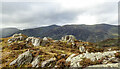 NY2616 : Rock outcrops on Brund Fell by Trevor Littlewood