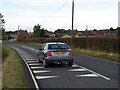 SK4690 : Road markings on Royds Moor Hill by Graham Hogg